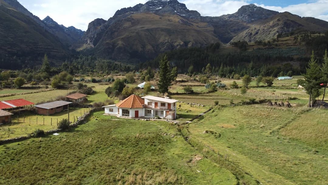 Mountain landscape and lodge setting in Pitumarca, Peru.